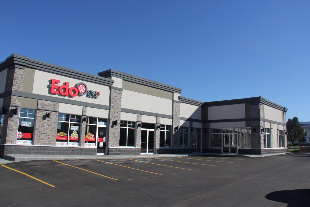 Splitface concrete block masonry installed by Met Exteriors on a commercial exterior in Stony Plain Alberta