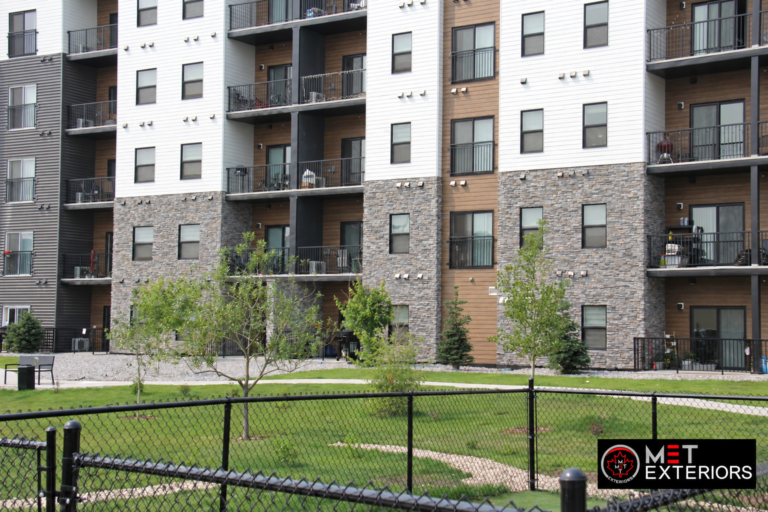 Multifamily exterior stone cladding project in Edmonton Alberta by Met Exteriors