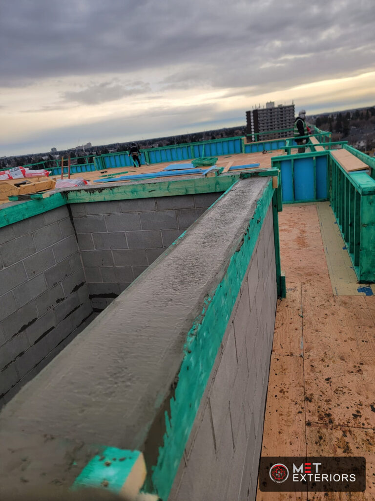 Interior view of CMU elevator shaft walls aligned on an Edmonton project