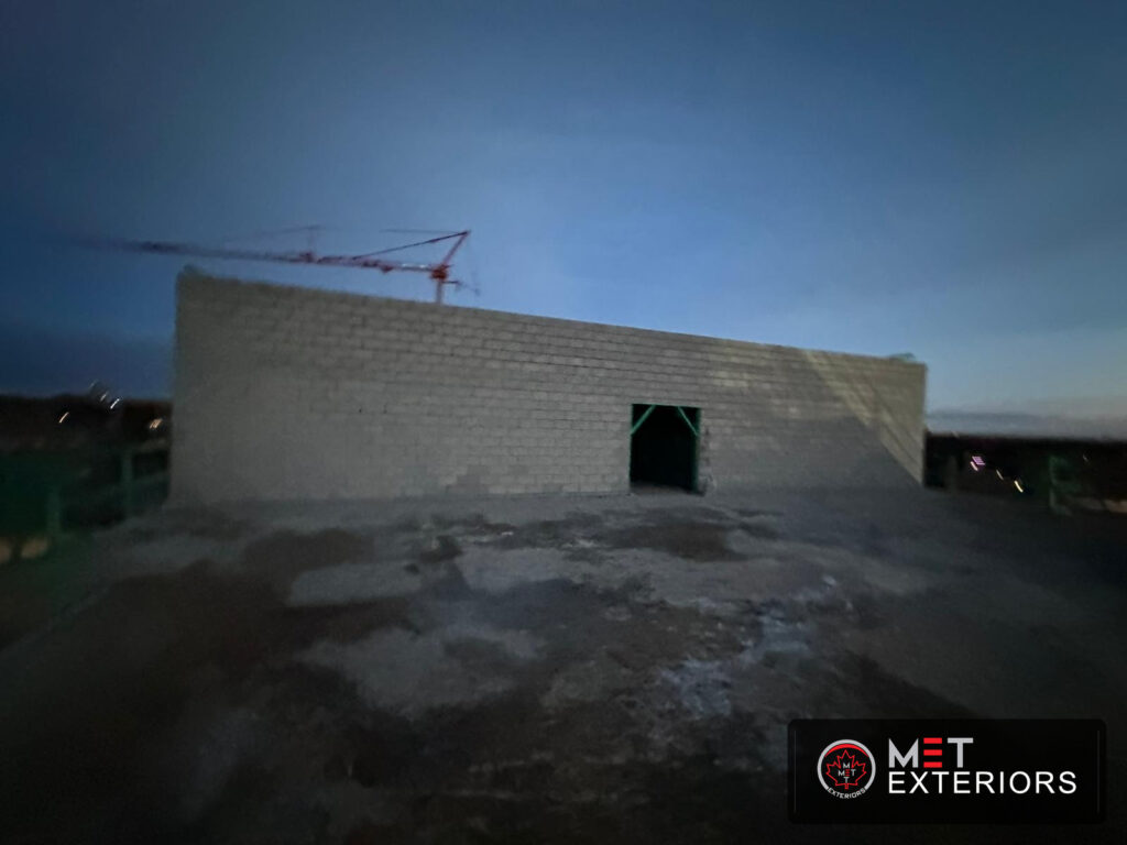 Commercial CMU firewall constructed by Met Exteriors in Edmonton