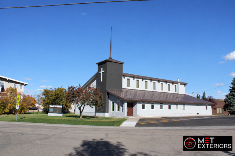Renovated church exterior in Leduc Alberta with EIFS and split-face stone by Met Exteriors