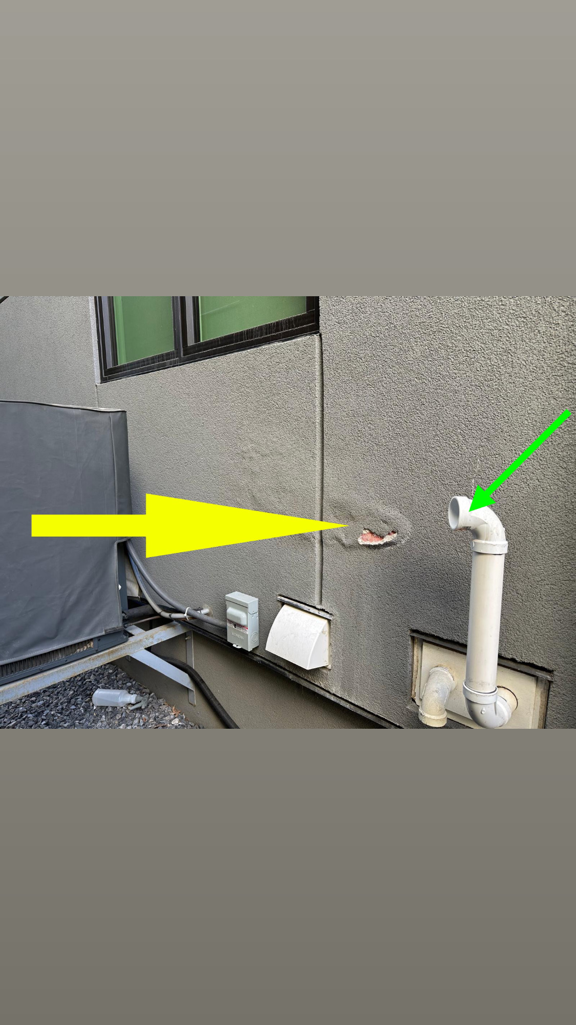 Annotated site photo identifying stucco damage and nearby furnace exhaust pipe